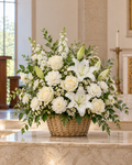 Pure Light Basket white lilies ivory roses cream flowers and greenery in natural woven funeral sympathy basket