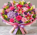 Signature Garden hand-tied bouquet by Flowers Planet
