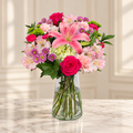 First Blush — Flowers Planet floral arrangement, styled on ivory marble
