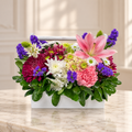 Wild Beauty — Flowers Planet floral arrangement, styled on ivory marble
