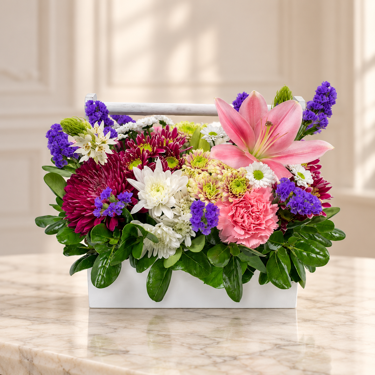 Wild Beauty — Flowers Planet floral arrangement, styled on ivory marble